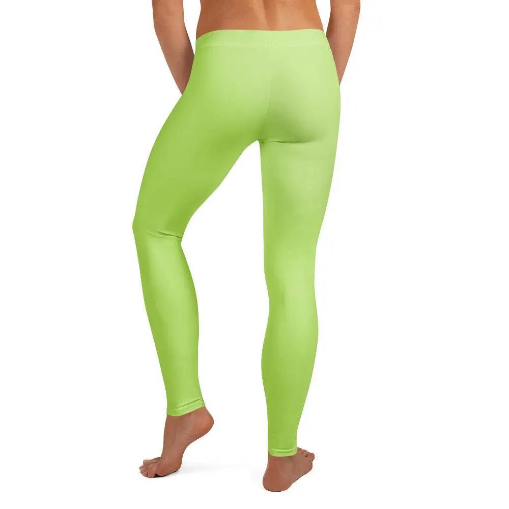Woman wearing bright green SPRING Leggings from the back, showing smooth, stretchy fabric and elastic waistband