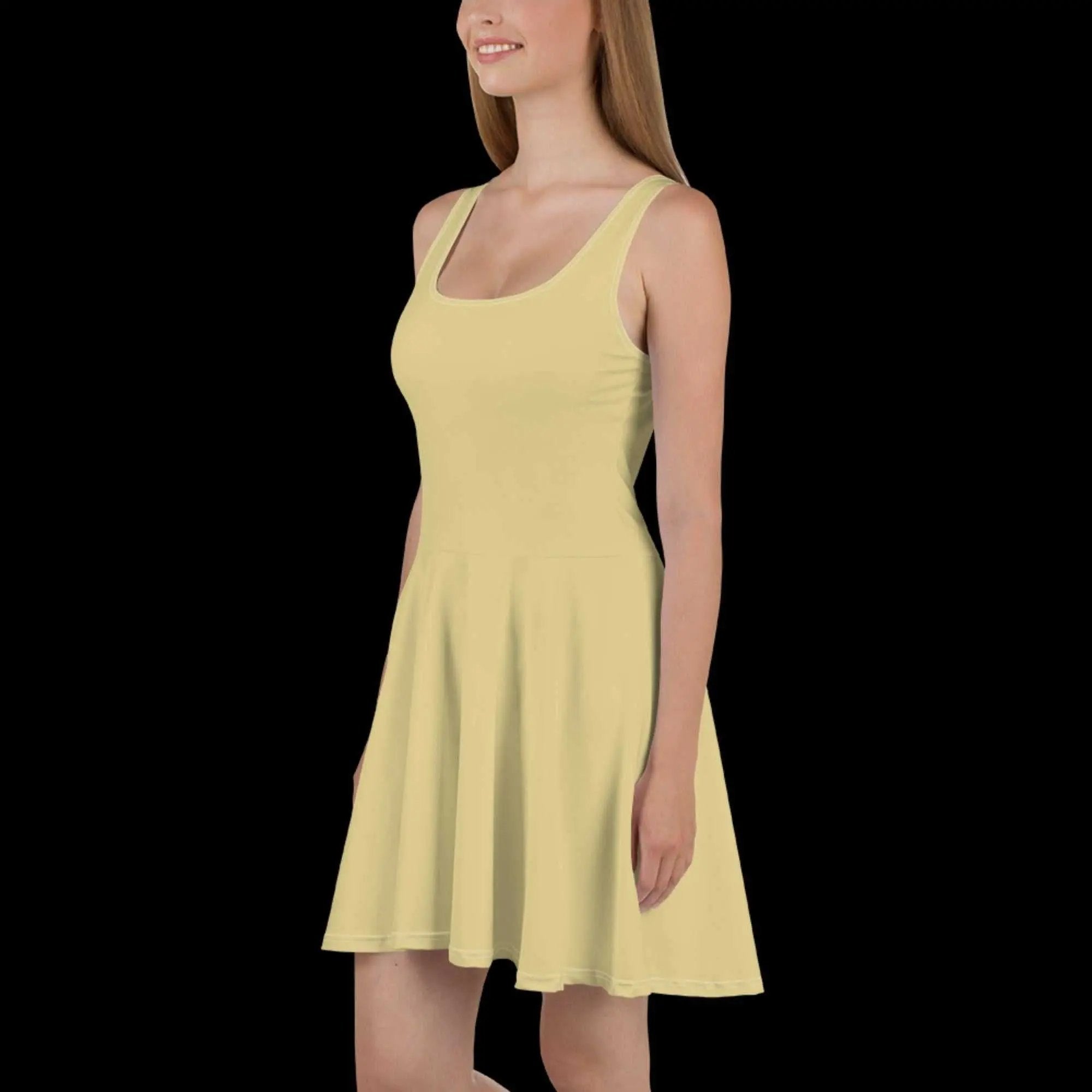 Woman wearing sleeveless yellow SANDY SYMPHONY Skater Dress with flared mid-thigh skirt on black background